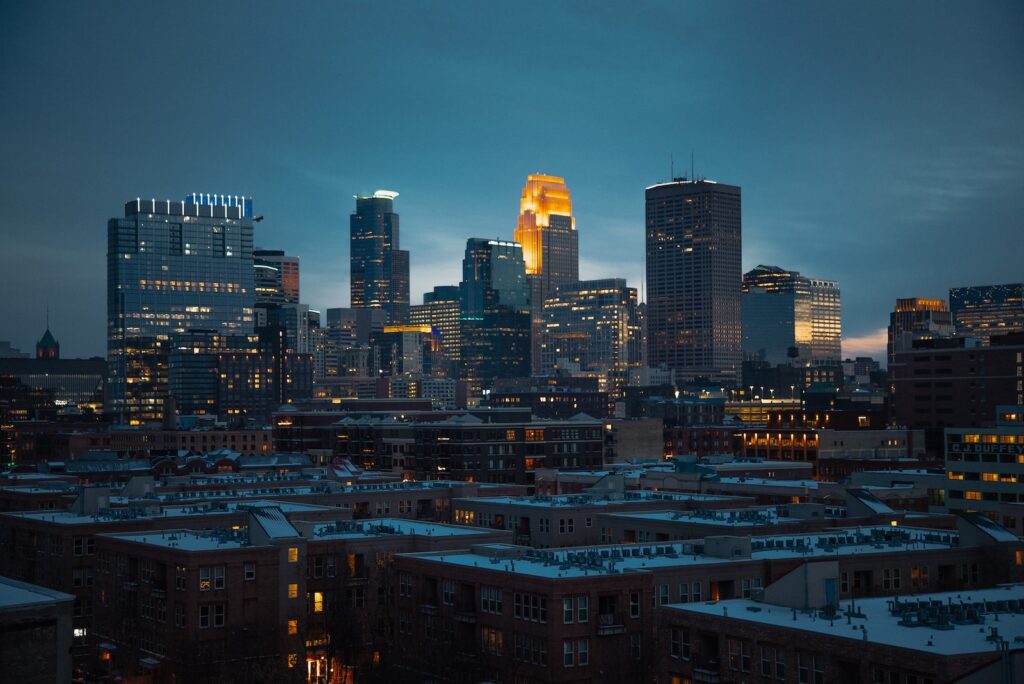 Skyscrapers in Minneapolis, MN with snow dusted on the roofs