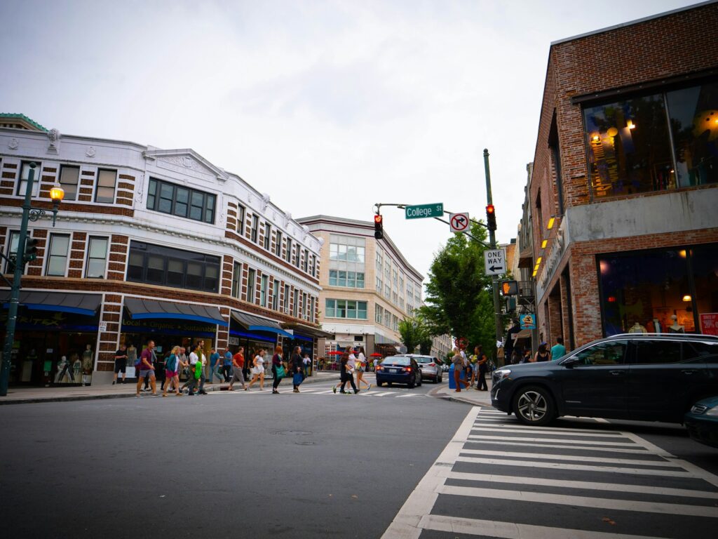 a busy street with people and cars